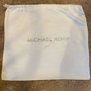EUC Michael Kors signature dust bag silky white with silver lettering 19” x 18”